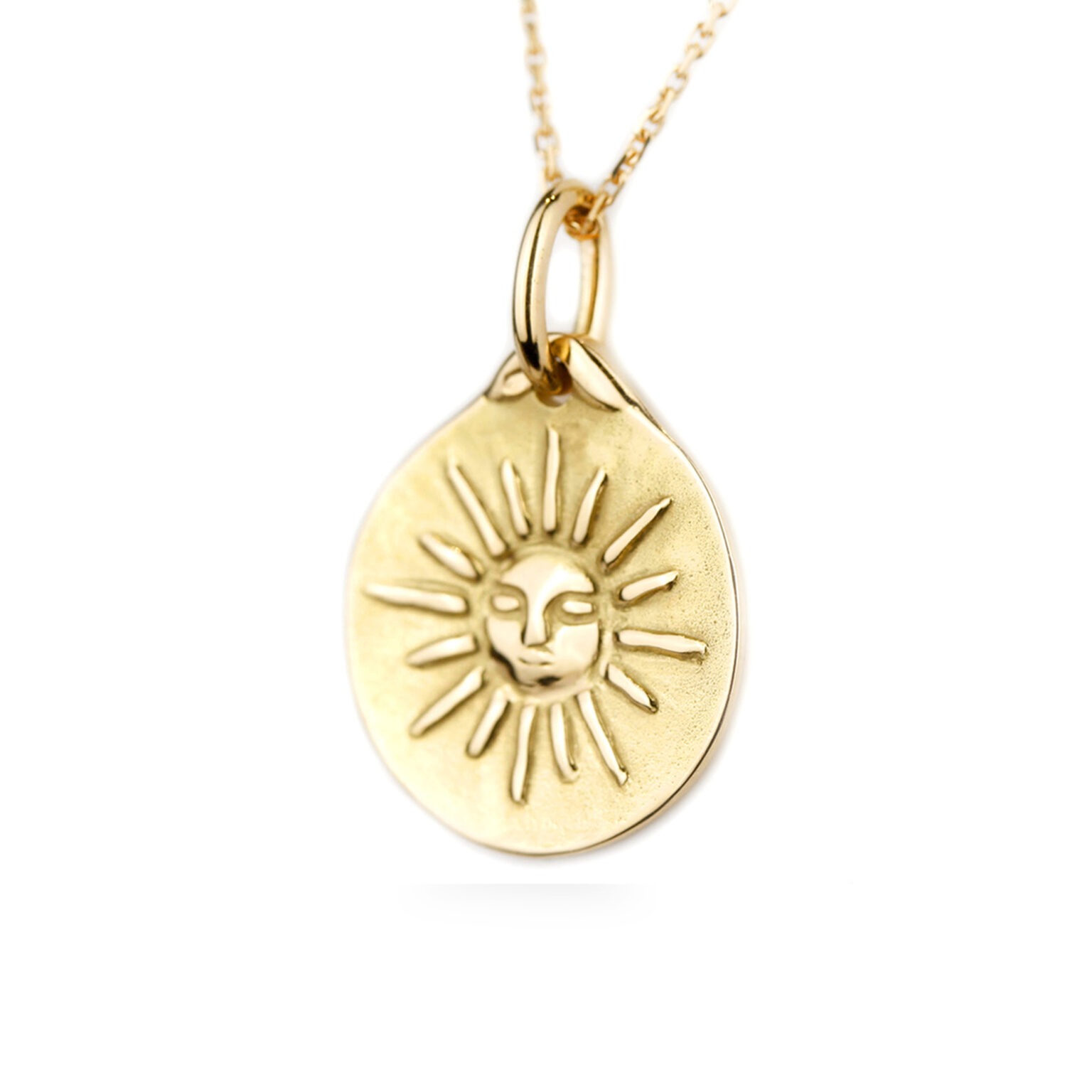 Pendentif soleil en or